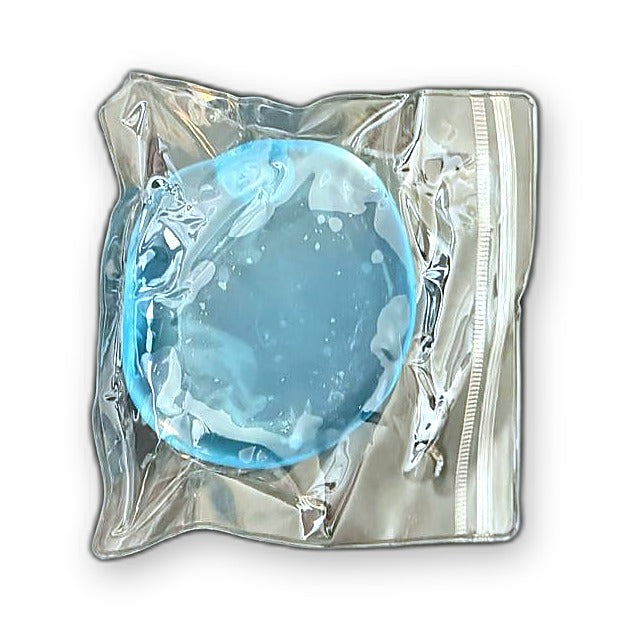 Blue Squishlotte Original Squishy in its clear bag.