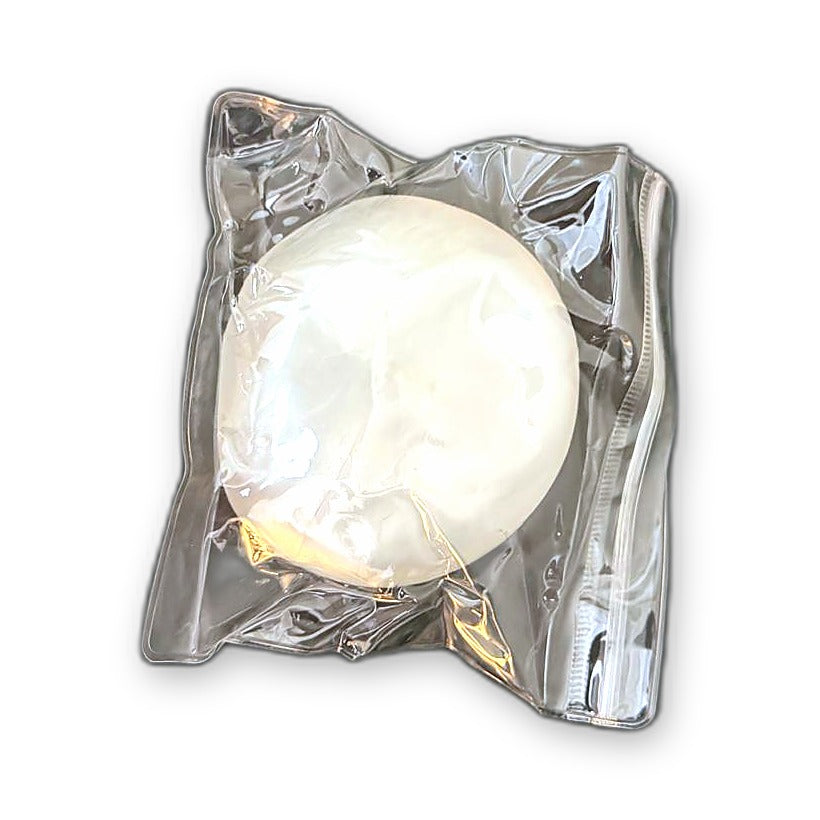 White/Silver Squishlotte Original Squishy in its clear bag.