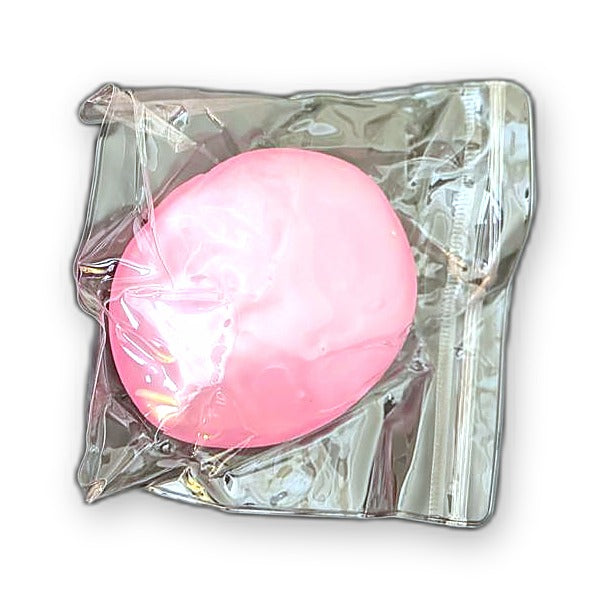 Pink Squishlotte Original Squishy in its clear bag.